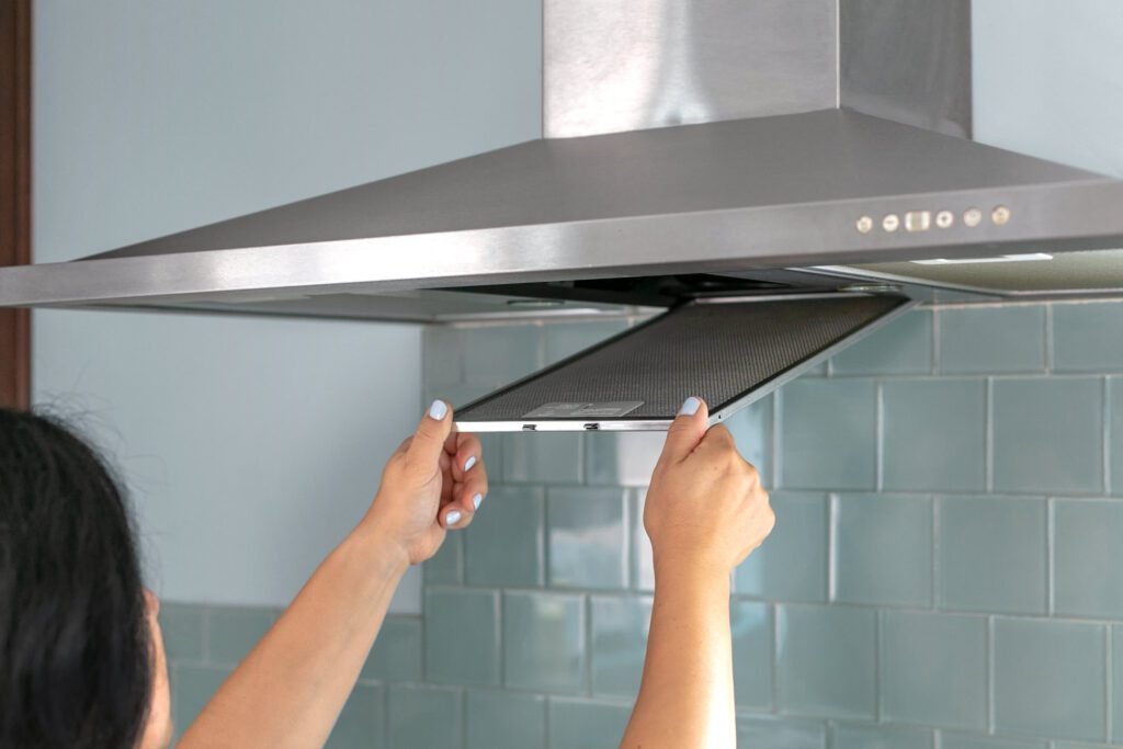 how to clean the cooker hood filter
